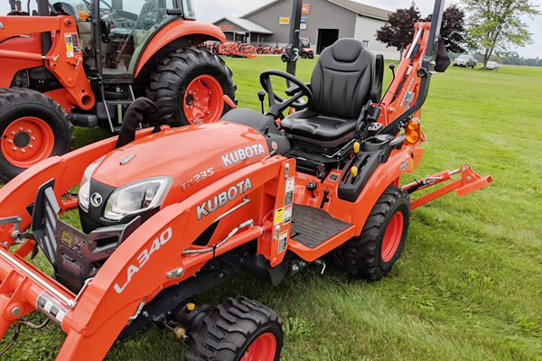 Kubota BX23-Tractor, Loader, and Backhoe. $17,900!